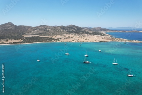 Aerial views from over the Greek Island of Antiparos, looking out towards the adjacent island of Despotiko © David