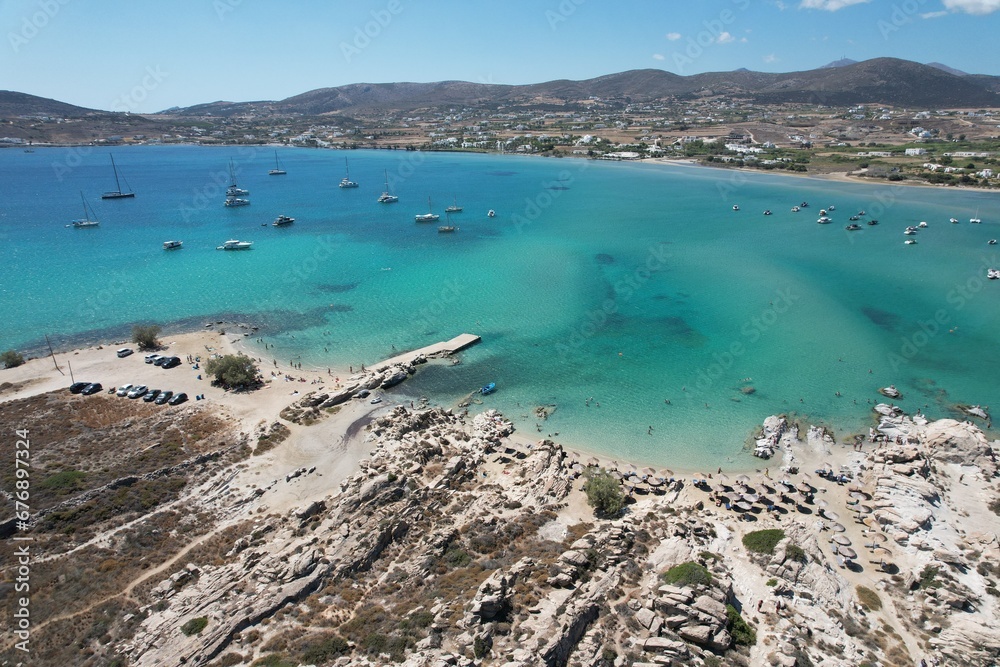 Aerial views from over Kolympethres Beach on the Greek Island of Paros. 