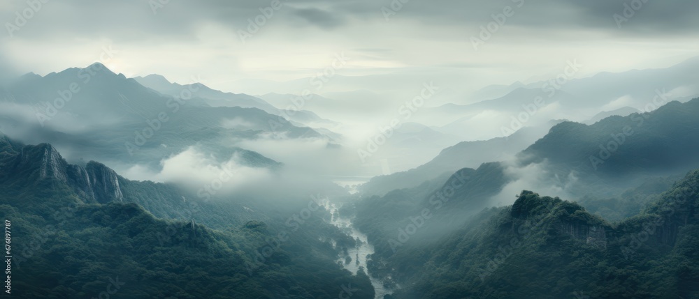 Misty mountains fading into the distance. foggy mountain. aerial view of mountain and river