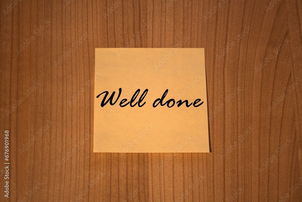 Post-it note Well done wooden background Post-it note Well done wooden background