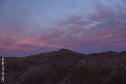 Pink Clouds Reach Across The Empty Desert Of Big Bend