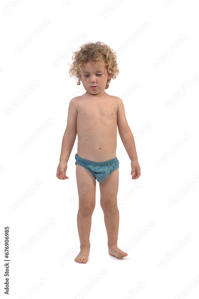 portrait of a boy in underpants look down on white background (3 year old) portrait of a boy in underpants look down on white background (3 year old)