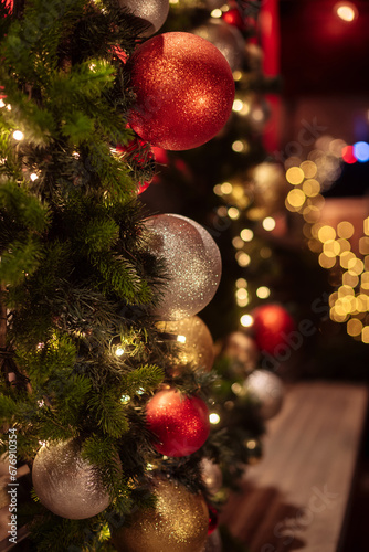 Christmas background with bokeh, Christmas trees and decorations, soft focus, space for text