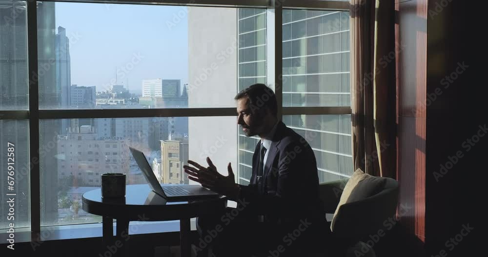 Businessman reading bad news on a laptop, feels frustrated upset, get awful message. Distressed man in suit receive bad news mail at office Businessman reading bad news on a laptop, feels frustrated upset, get awful message. Distressed man in suit receive bad news mail at office