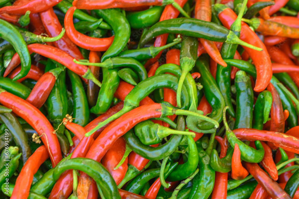 fresh appetizing red and green hot peppers at the bazaar on the island of Cyprus in autumn 1 fresh appetizing red and green hot peppers at the bazaar on the island of Cyprus in autumn 1