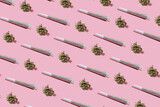Cannabis bud and joint for smoking. Pattern on a pastel background