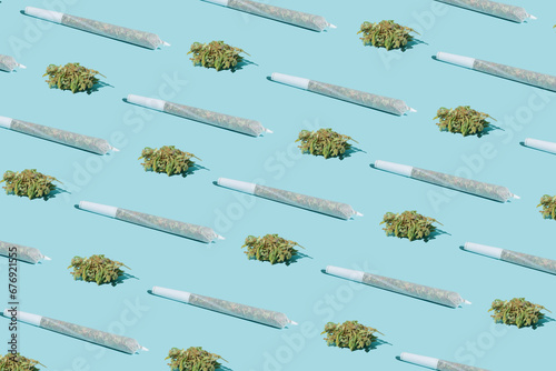 Cannabis bud and joint for smoking. Pattern on a pastel background