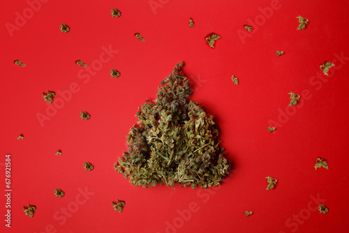 Cannabis bud in the shape of a Christmas tree. Creative Christmas concept