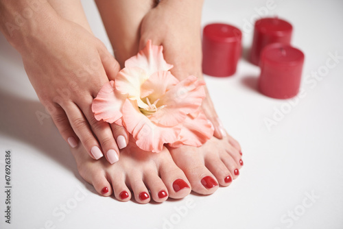Manicure and Pedicure with a pink flower