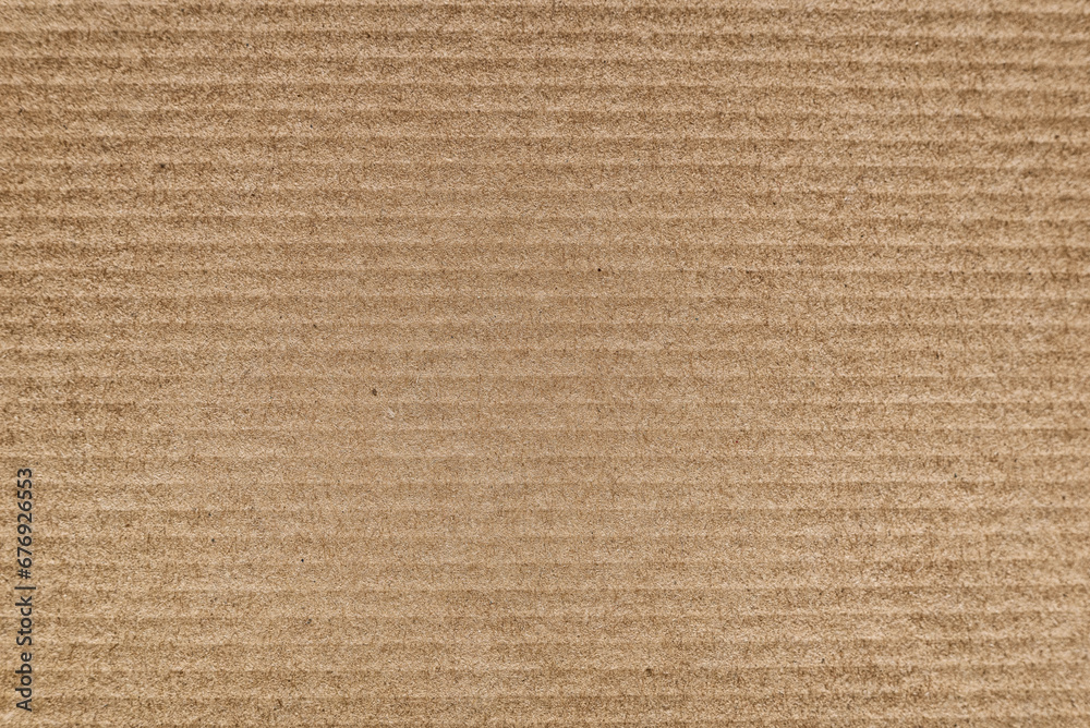 Close up paper texture of brown cardboard sheet. Close up paper texture of brown cardboard sheet.