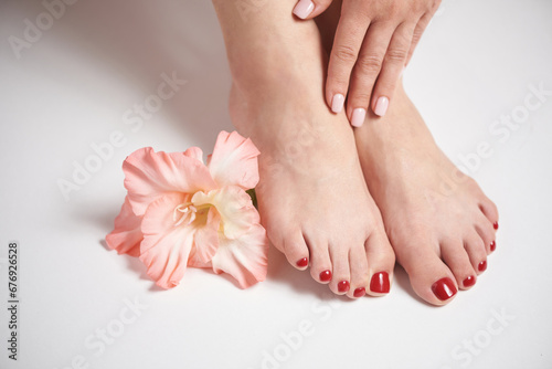 Manicure and Pedicure with a pink flower