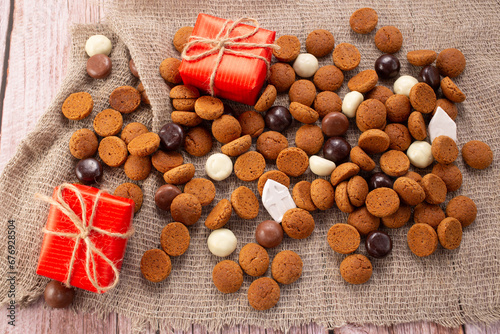 Dutch holiday Sinterklaas background with traditional sweets pepernoten for St. Nicholas Day