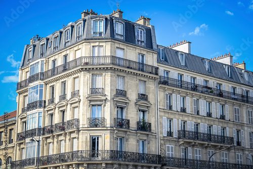 Fototapeta Naklejka Na Ścianę i Meble -  A Haussmann-style building (flat) in Paris, France on July, 16, 2023.