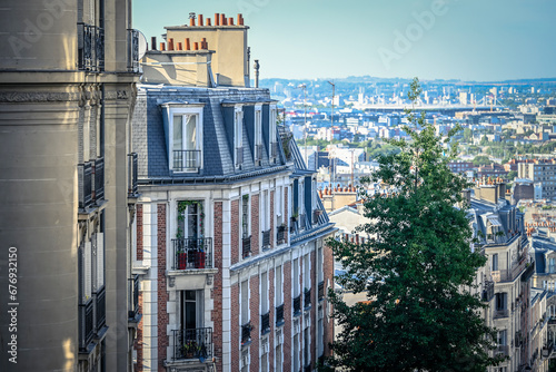 Fototapeta Naklejka Na Ścianę i Meble -  A Haussmann-style building (flat) in Paris, France on July, 16, 2023.