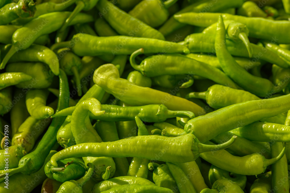 fresh appetizing green hot peppers at the bazaar on the island of Cyprus in autumn 2 fresh appetizing green hot peppers at the bazaar on the island of Cyprus in autumn 2