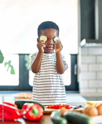 child family kitchen food boy son little meal fun preparing healthy diet eating home black african american morning ingredient breakfast vegetable cooking alone portrait