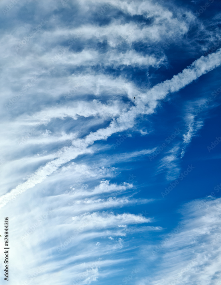 Stunning cirrus cloud formation panorama in a deep blue sky Stunning cirrus cloud formation panorama in a deep blue sky