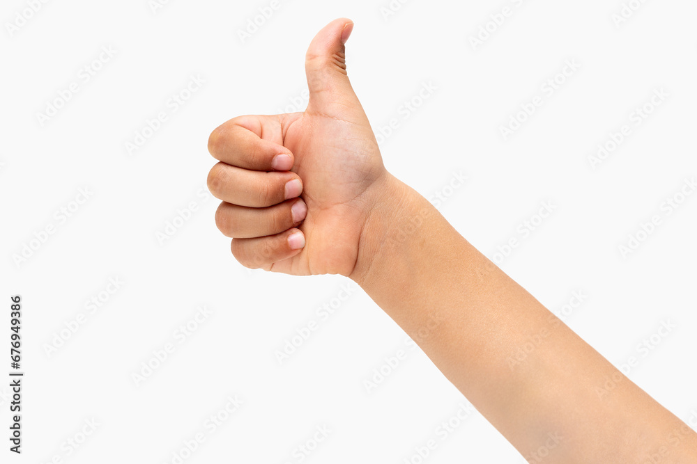 Child hand gesturing thumb up isolated on white background Child hand gesturing thumb up isolated on white background