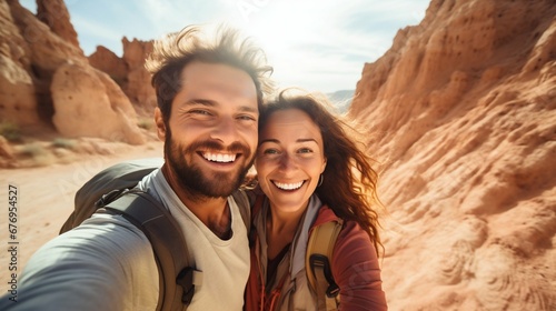 Joyful Couple Capturing Selfie in Rocky Desert on Summer Vacation. Generative ai © Scrudje