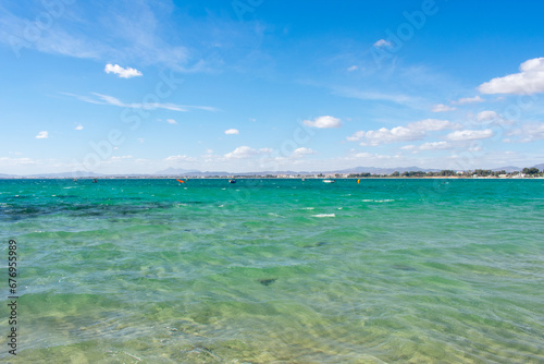 Hammamet Tunisia, Beach and boats on shallow water, view on Mediterranean sea 