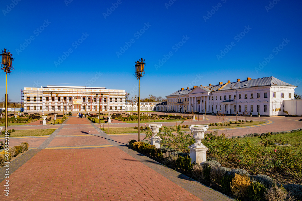 Historical buildings, architecture, park. Autumn day, sunny.