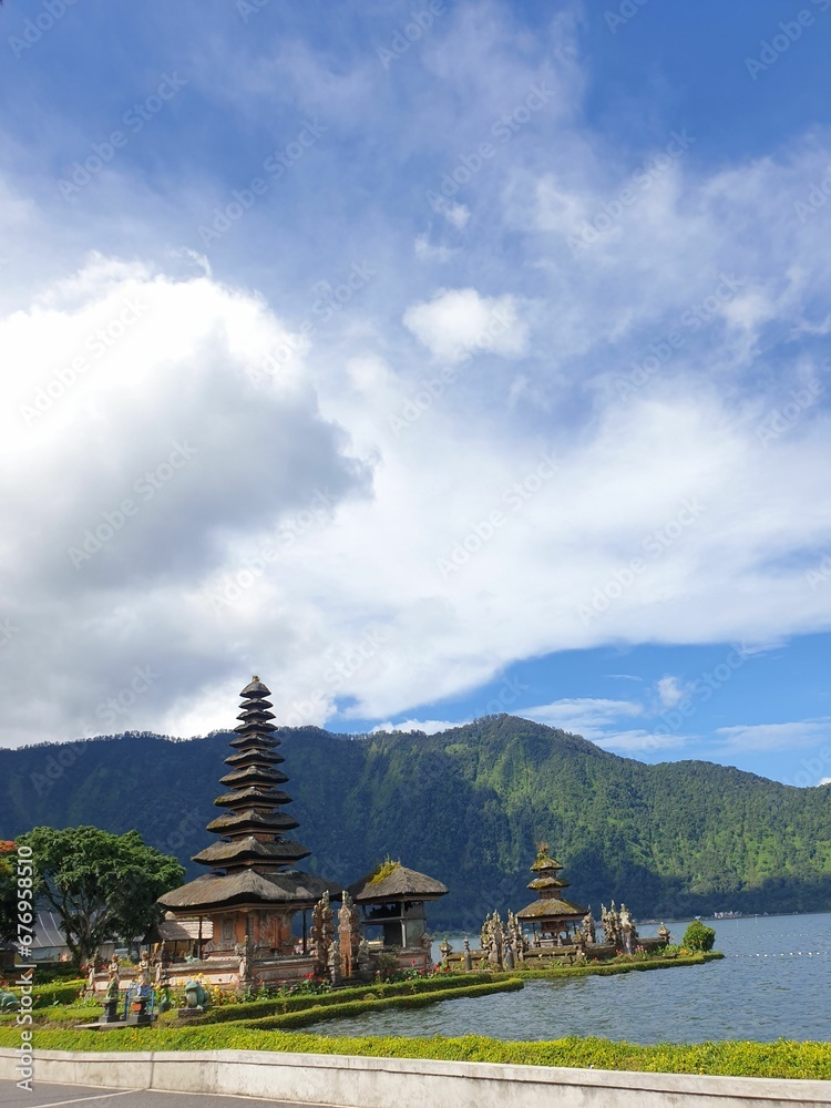 Vertical shot of the Pura Ulun Danu Bratan a major Hindu Shaivite temple in Bali, Indonesia Vertical shot of the Pura Ulun Danu Bratan a major Hindu Shaivite temple in Bali, Indonesia