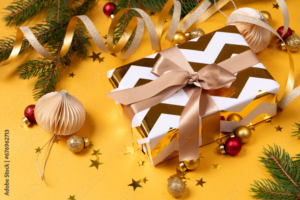 Gifts  and christmas decorations  on yellow  background. Christmas New Year background.