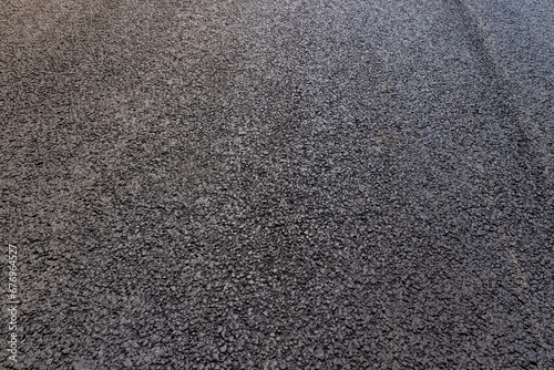 a close-up of a part of a new paved road