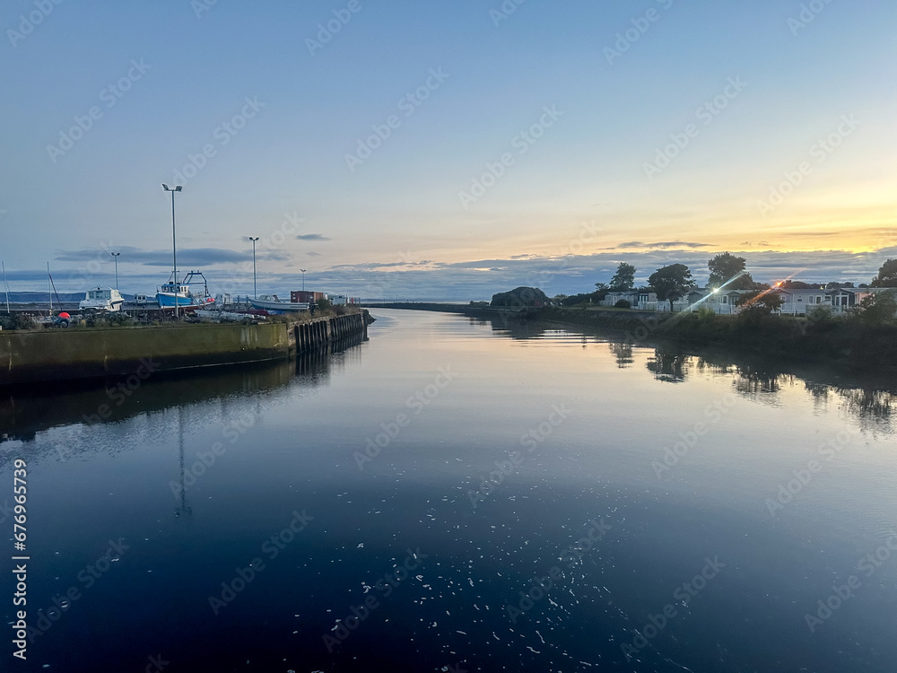 Nairn, Scotland - September 24, 2023: Views along the water's edge at sunrise in the seaside town of Nairn, Scotland
