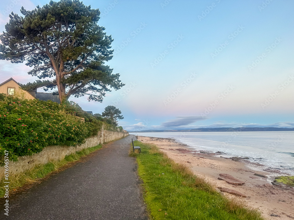 Nairn, Scotland - September 24, 2023: Views along the water's edge at sunrise in the seaside town of Nairn, Scotland
Nairn, Scotland - September 24, 2023: Views along the water's edge at sunrise in the seaside town of Nairn, Scotland