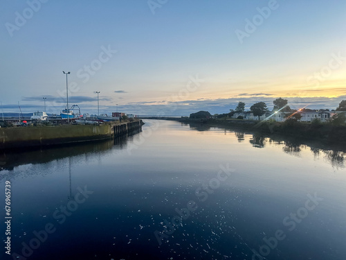 Nairn, Scotland - September 24, 2023: Views along the water's edge at sunrise in the seaside town of Nairn, Scotland 