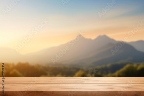 wooden table background and blurred landscape of mountains and sky with sunlight in cozy tone