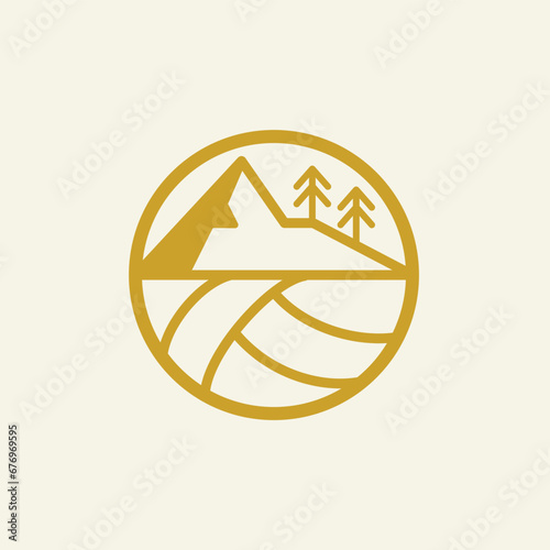 a mountain with trees and a volleyball in a circle logo