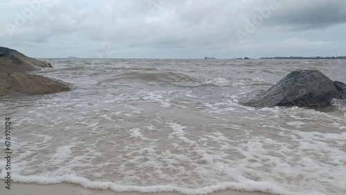 waves breaking on the beach