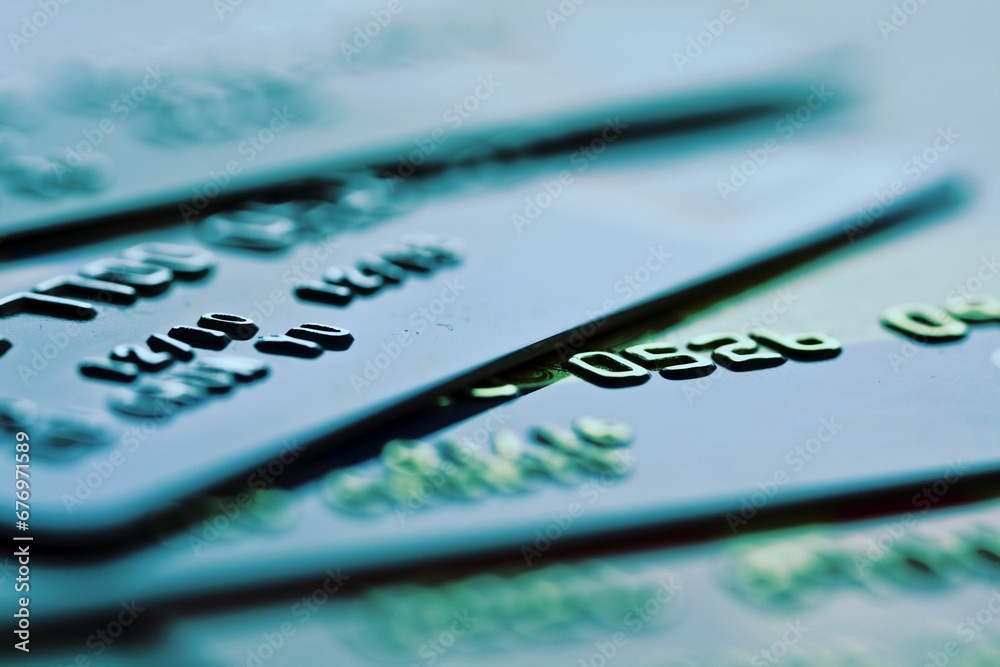 Closeup shot of account numbers on bank cards Closeup shot of account numbers on bank cards