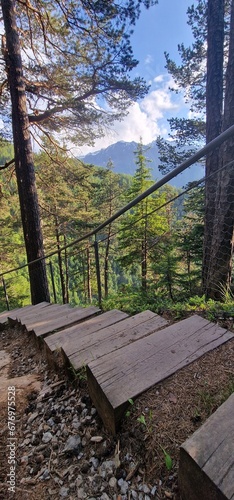 highest waterfall in Tyrol is the 159-meter-high Stuibenfall. It dazzles passers-by with its enormous water amount. An exciting point during the trail is an 80-meter-long steel suspension bridge over  photo