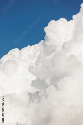 white cumulus clouds in blue sky, beautiful view of the sky and storm clouds. Huge majestic cloud phenomena. nature atmosphere ecology weather. Storm warning, weather change before storm thunderstorm