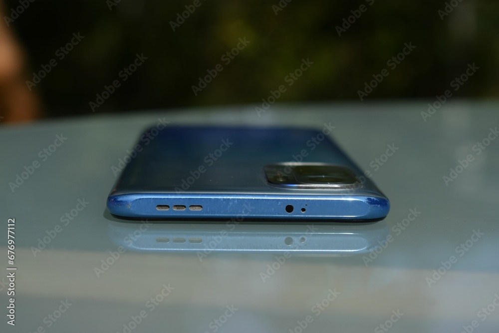 Closeup of a screen down phone on the table