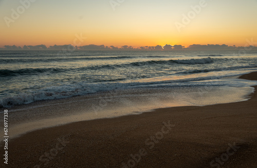 Wallpaper Mural Crashing waves during golden hour at sunrise on Florida beach Torontodigital.ca