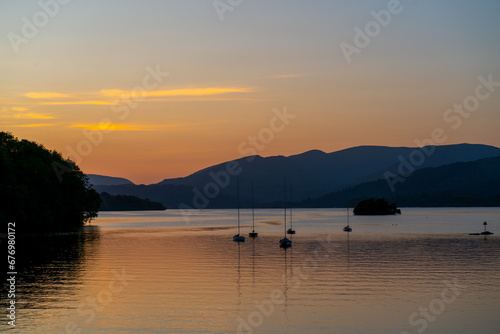 Sunset on Lake Windermere in the English Lake District from the town of Bowness.