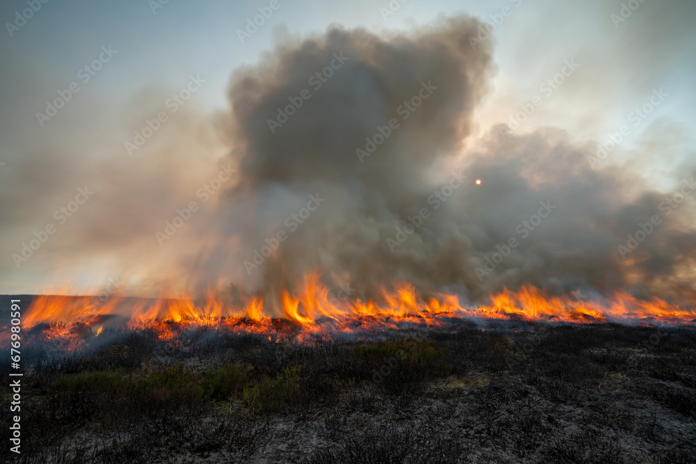 Moorland management, heather burning in the North York Moors National Park, England. Swithens burning.