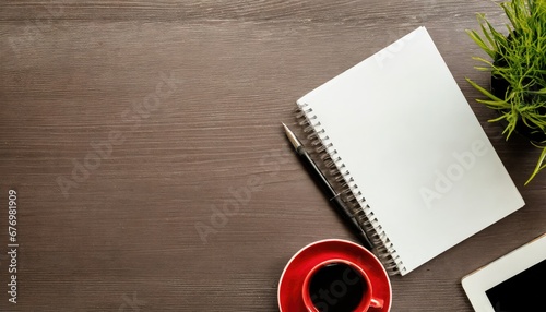 Obraz na płótnie Cahier Blanc et Tasse de Café sur Bureau en Bois w salonie