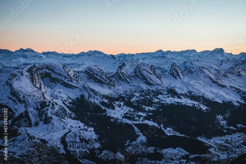 View of the Swiss Alps from a drone. Beautiful mountainous landscape.