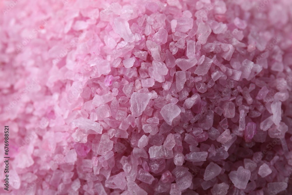 Fototapeta premium Beautiful pink sea salt as background, closeup