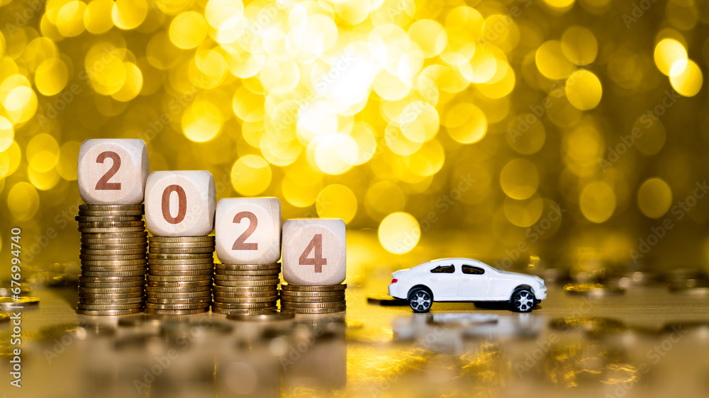 New Year 2024 Coins And Car Model Stock Photo Adobe Stock   1000 F 676994740 6DwrI7O04cVlxwhb8V7rxxO2emiMKqmZ 