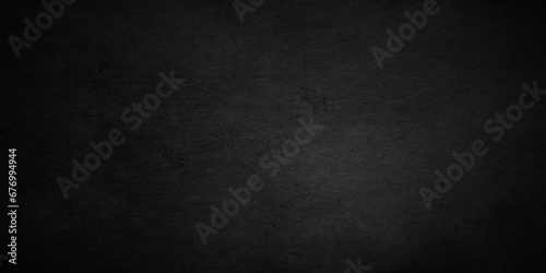 Dark Black grunge wall background texture, old vintage charcoal black backdrop paper texture. Abstract background with black wall surface, black stucco texture. Black gray satin dark texture.