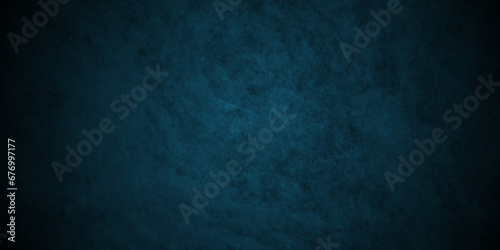Dark Blue stone wall texture grunge rock surface. dark gray and blue concrete background backdrop. wide panoramic banner. old wall stone for dark blue distressed grunge background.