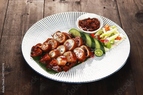 baked squids with chili called cumi bakar bumbu sambal or grill jumbo sotong