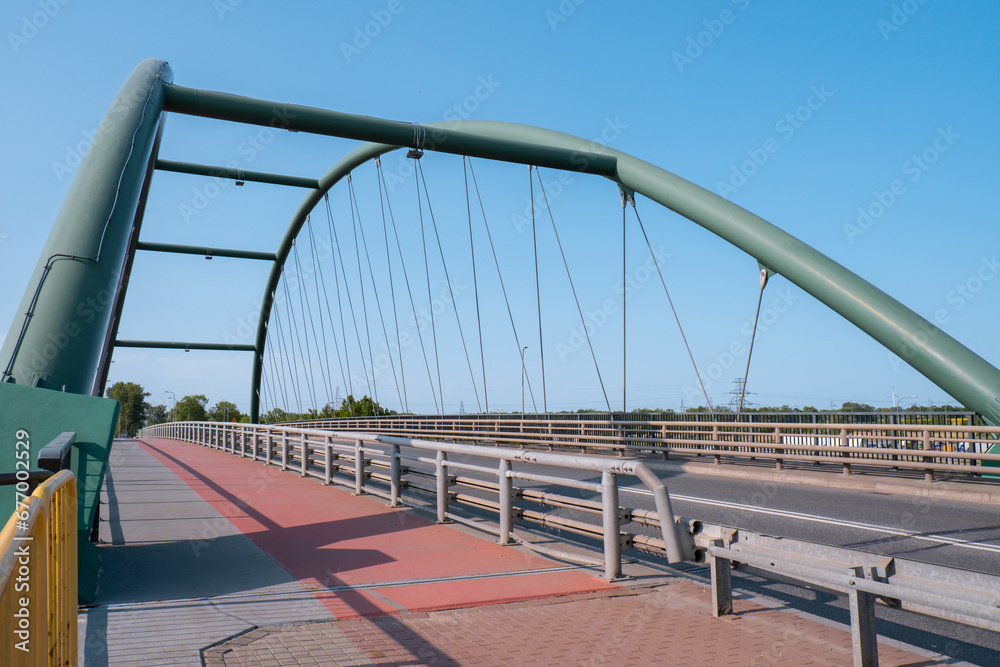 Obraz premium Bridge in Gdansk, Poland. Two lines for pedestrians and bikers. Empty bridge, no people, no cars in Gdansk Poland