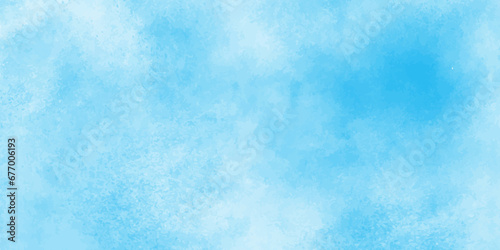 Defocused and blurry wet ink effect sky blue color watercolor background,Clouds on a blue background,beautiful and colorful watercolor used for wallpaper,banner, design,painting,arts,printing.